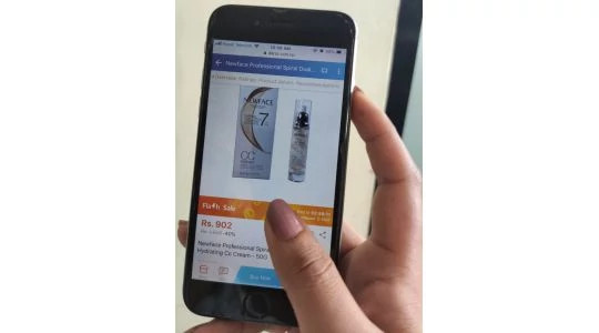 A person purchasing an online product